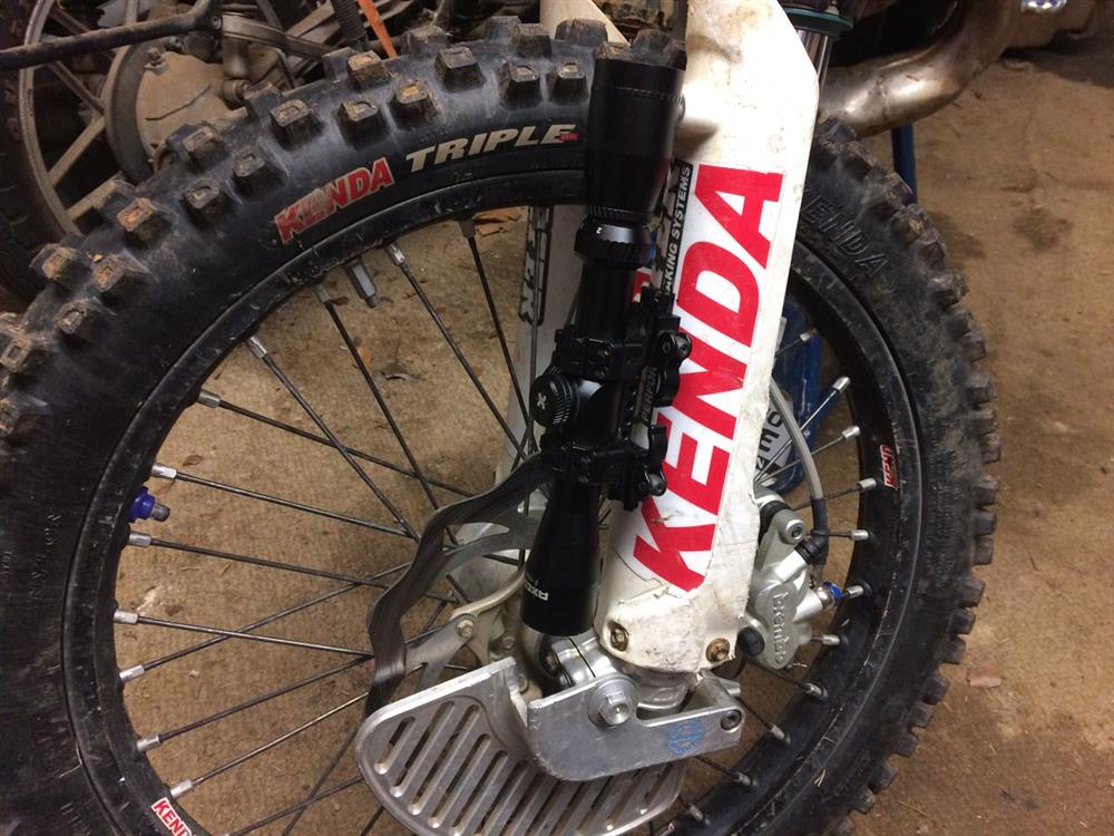 Axeon Optics 2-7X32 attached to a dirt bike